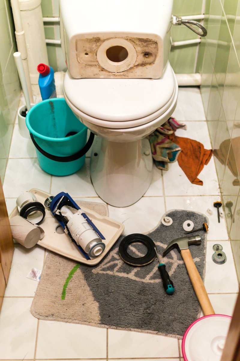 New toilet being installed in a Longfield bathroom